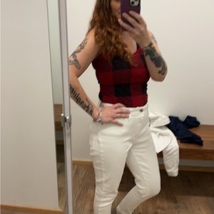 Woman’s white jeans and shirt